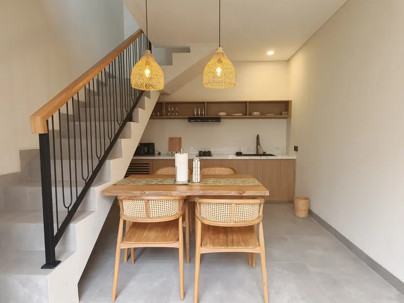 Dining table under the timber stair