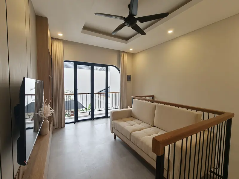 Living room with sofa and ceiling fan